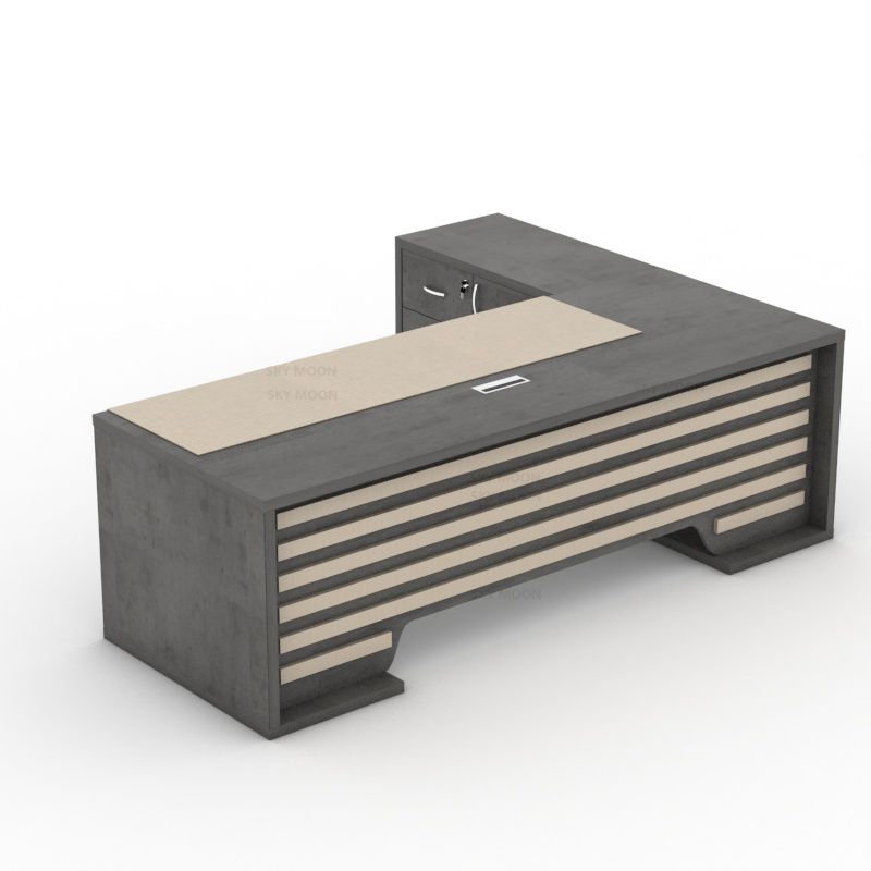 "A modern L-shaped executive desk in charcoal grey featuring a slatted front design and a beige desk pad."