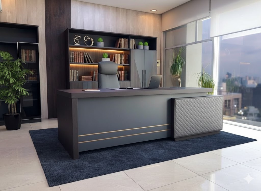 "A modern charcoal grey L-shaped executive desk featuring a diamond-quilted side storage return and parallel gold accent lines on the front panel."