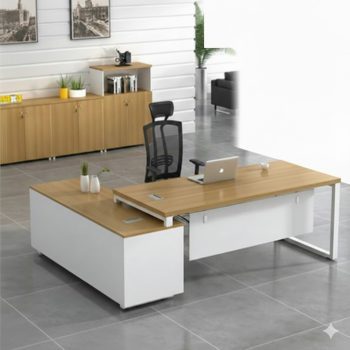 "A modern L-shaped manager desk featuring a light wood grain desktop, clean white metal loop frame legs, and an integrated white side storage return cabinet."