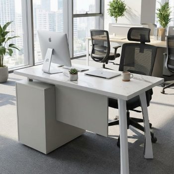 "A contemporary modern staff desk featuring a white marble-patterned rectangular desktop, an attached light grey side return cabinet, and angled light grey metal legs."