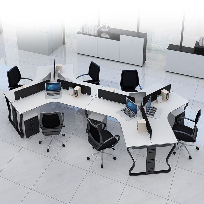 "A modular 6-person office workstation configuration featuring a continuous white top formed by interconnected, angled 120-degree desks, divided by low-profile black privacy screens and supported by wavy black metal legs."