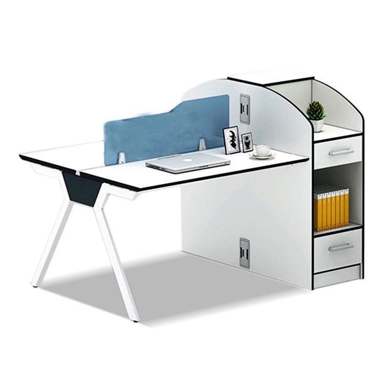 "A modular 2-person back-to-back office workstation desk featuring clean white surfaces with black trim, a central blue privacy divider screen, angular white metal trestle legs, and a tall, integrated white end storage tower with shelving and drawers."