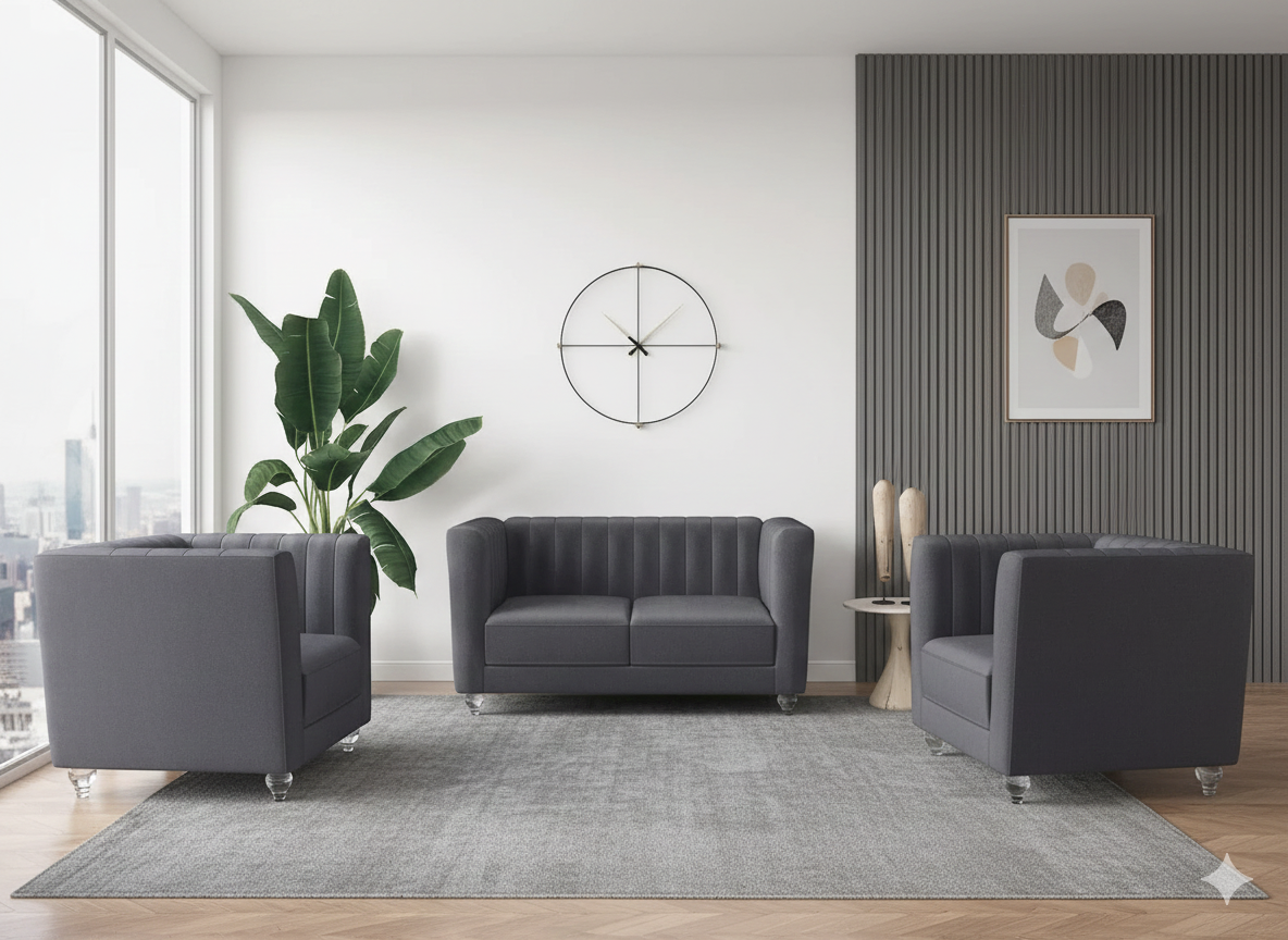 A modern three-piece seating set including a two-seater loveseat and two matching armchairs, featuring charcoal gray channel-tufted fabric and decorative clear acrylic legs.