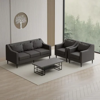 "A modern five-seater office lounge set featuring a dark charcoal gray three-seater sofa and two matching single armchairs with sloped armrests, plush back cushions, and thin black tapered legs."