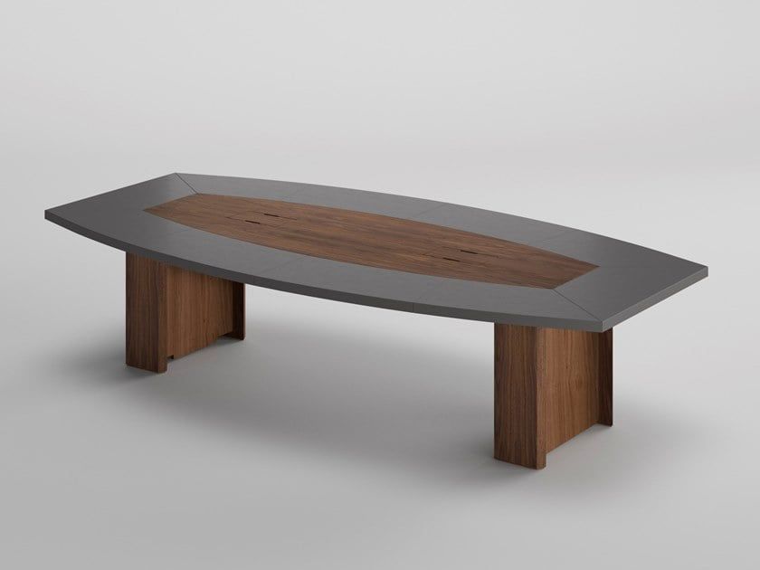 "A boat-shaped executive conference desk featuring a matte grey outer border framing an oval-shaped center wood panel with integrated wire cutouts, supported by thick matching wood panel pedestal bases."