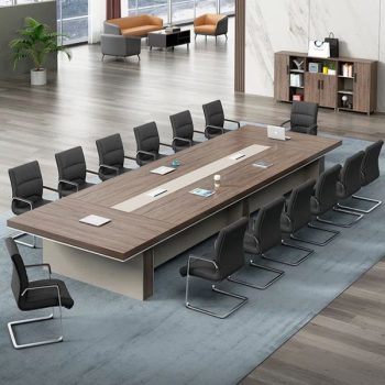 "An extra-large, rectangular executive boardroom desk featuring a thick walnut wood-grain tabletop with a wide, light beige center media inlay track, supported by a heavy matching dual-tone pedestal base."