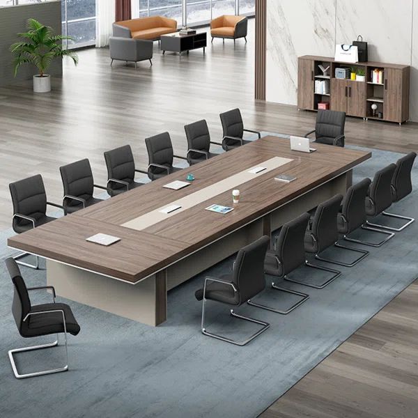 "An extra-large, rectangular executive boardroom desk featuring a thick walnut wood-grain tabletop with a wide, light beige center media inlay track, supported by a heavy matching dual-tone pedestal base."