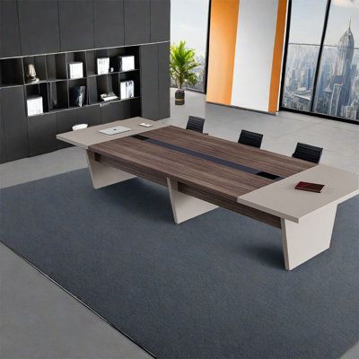"A large, executive conference room meeting table featuring a dark walnut wood-grain center top with a long black media stripe, flanked by beige-gray end-cap surfaces and supported by angled, flat panel pedestal legs."