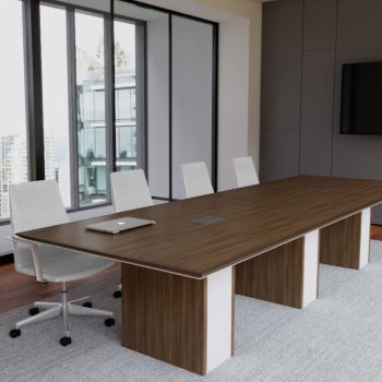 "A long, rectangular executive boardroom desk featuring a dark walnut wood-grain top with a thin white edge profile, supported by three thick pedestal block bases in matching wood-grain with white side-panel accents."