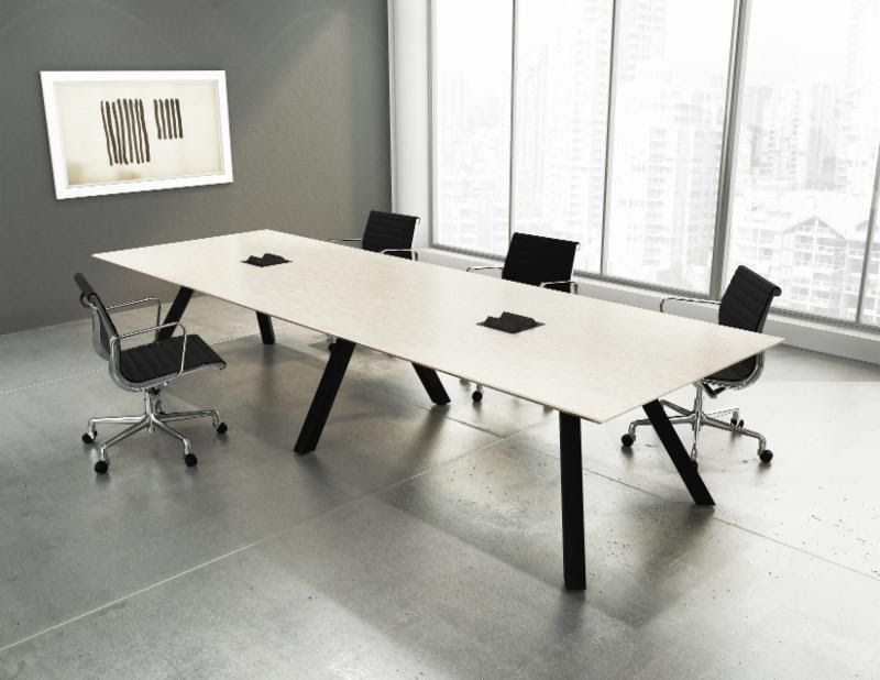 "A long, modern rectangular conference meeting desk featuring a ultra-light oak wood-grain top with two black pop-up power outlets, supported by an industrial black metal underframe with thick, angled splayed legs."