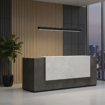A contemporary linear reception desk featuring a dark charcoal slate-textured body with a central, overlapping light gray concrete-finish privacy panel and a narrow white transaction top.