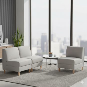 "A modern three-piece modular lounge set featuring a light gray fabric two-seater loveseat and a matching single armchair, both with an armless design and light wood tapered legs."